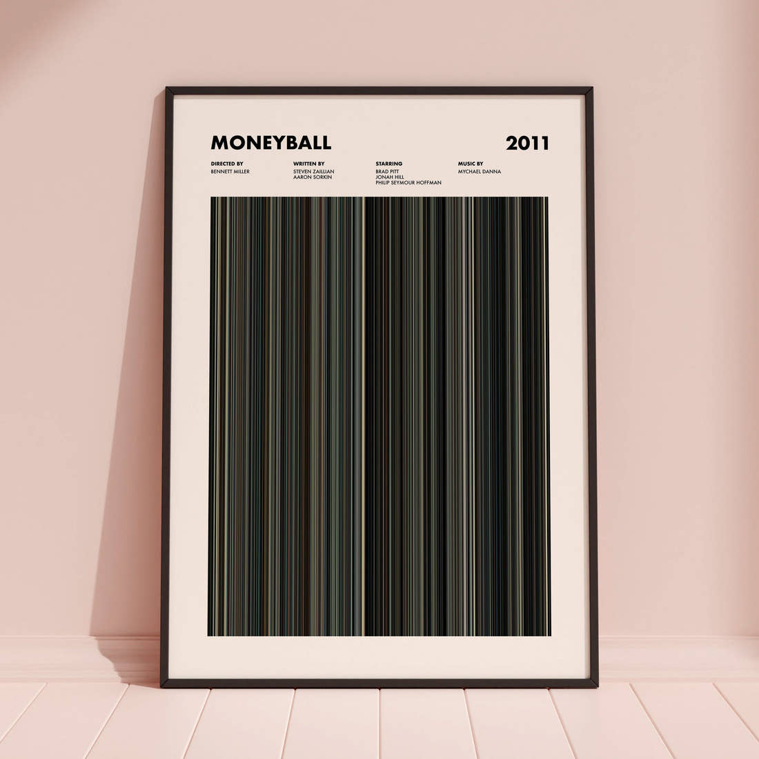 Moneyball Movie Barcode Poster framed and leaning against a coloured wall