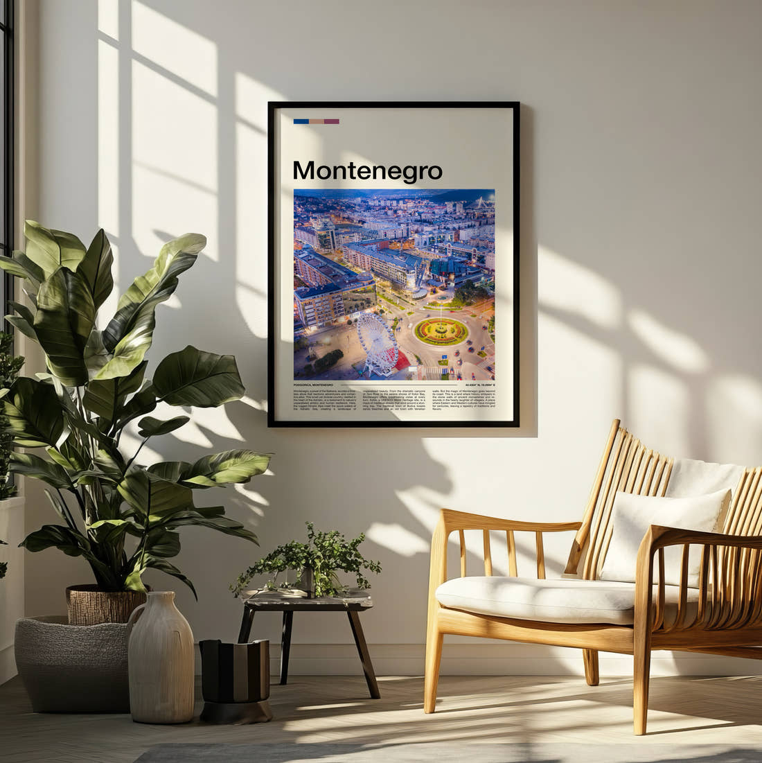 Montenegro Aerial City At Night Travel Print framed on a pale wall beside houseplants