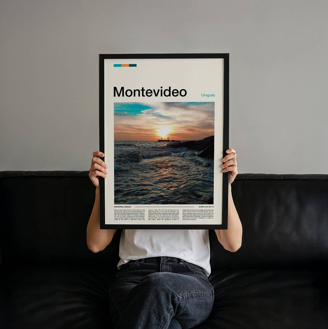 Montevideo Sunset Over Rocky Shore Travel Print held up by hand to show the size of the print