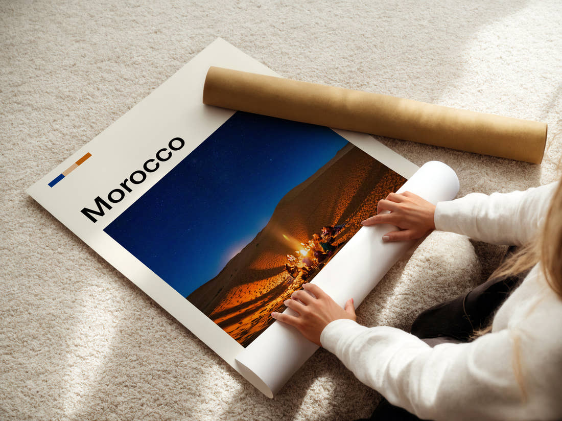 Morocco Desert Campfire Travel Print being unrolled from its postal tube