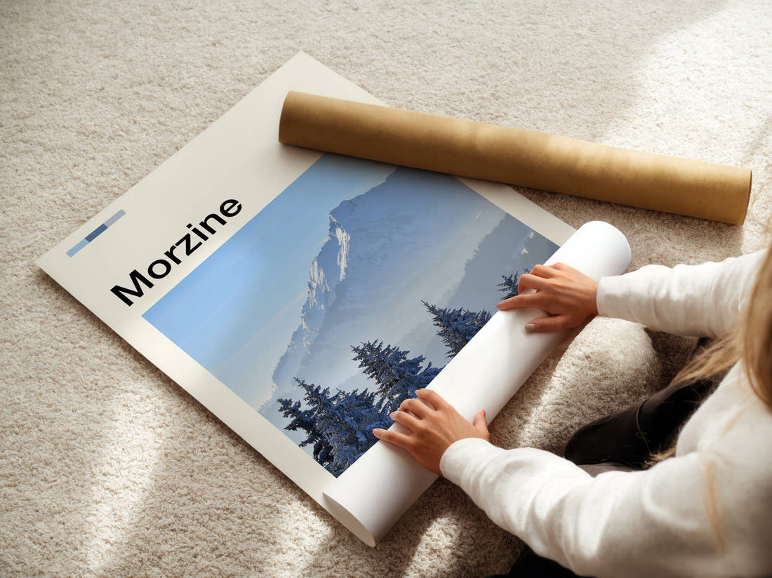 Morzine Snowy Pines And Peak Travel Print being unrolled from its postal tube