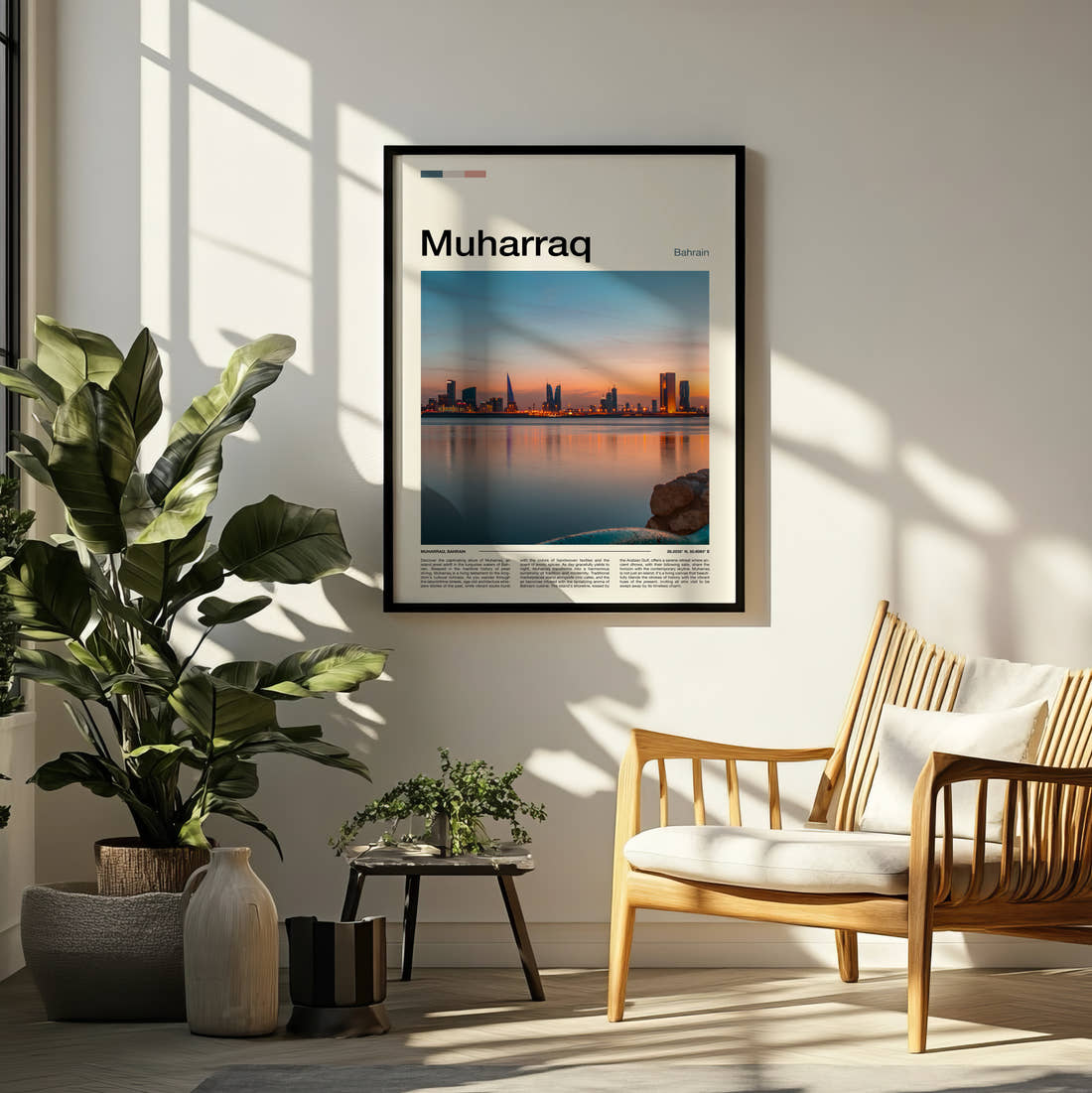 Muharraq Skyline Across The Water Travel Print framed on a pale wall beside houseplants