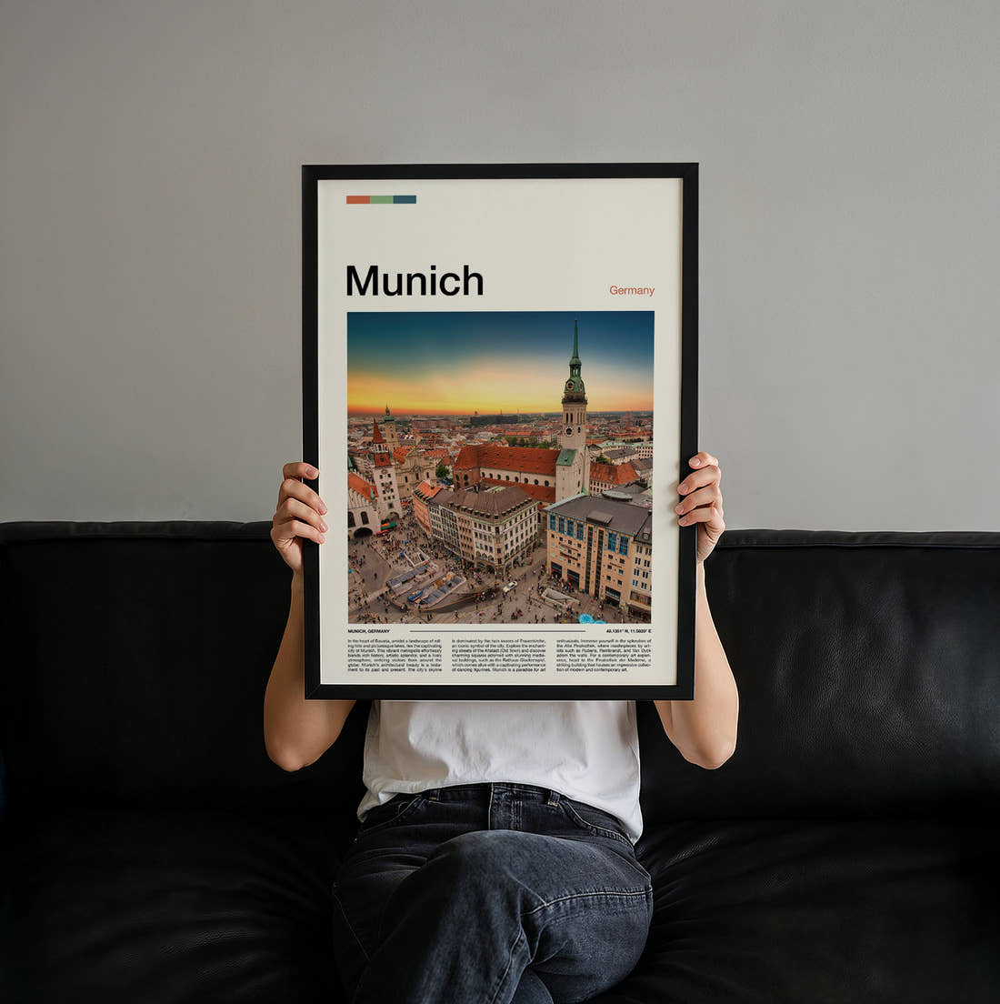Munich Rooftops At Sunset Travel Print held up by hand to show the size of the print