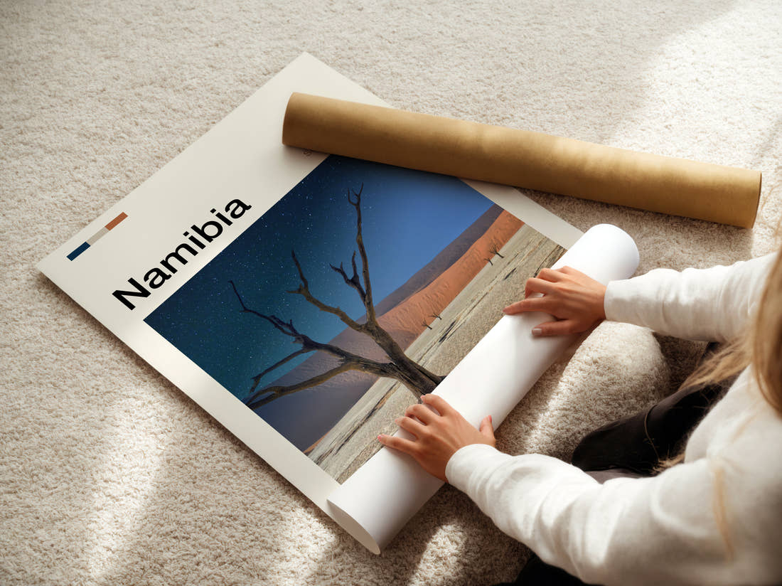 Namibia Dead Desert Tree Travel Print being unrolled from its postal tube