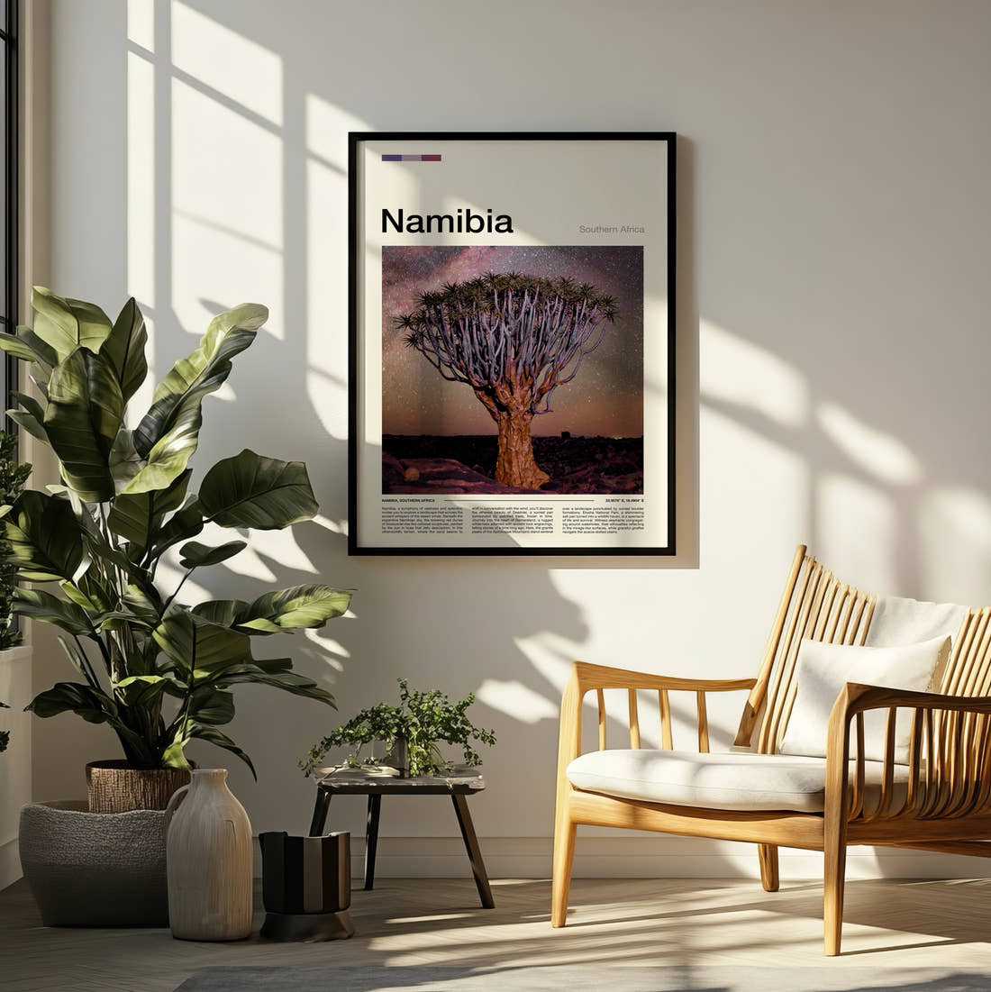Namibia Quiver Tree At Night Travel Print framed on a pale wall beside houseplants