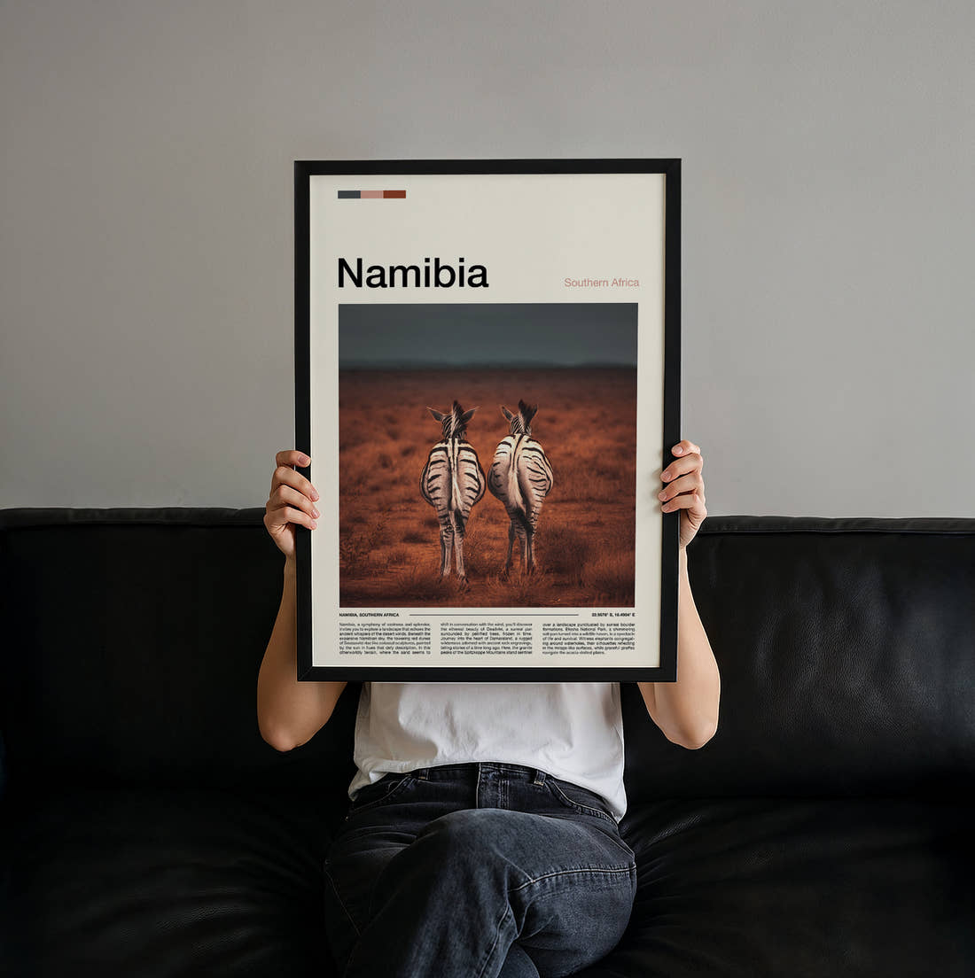 Namibia Two Zebras Travel Print held up by hand to show the size of the print