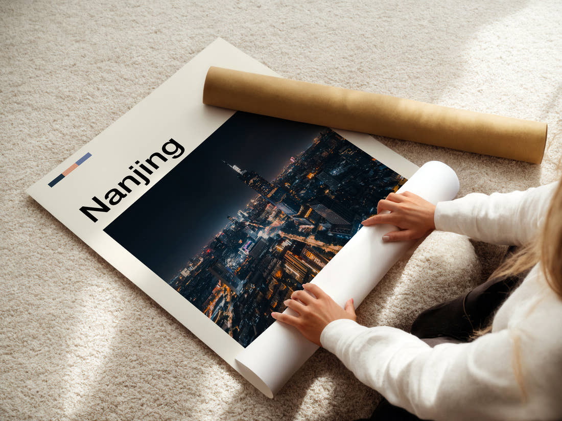 Nanjing Night Cityscape Travel Print being unrolled from its postal tube