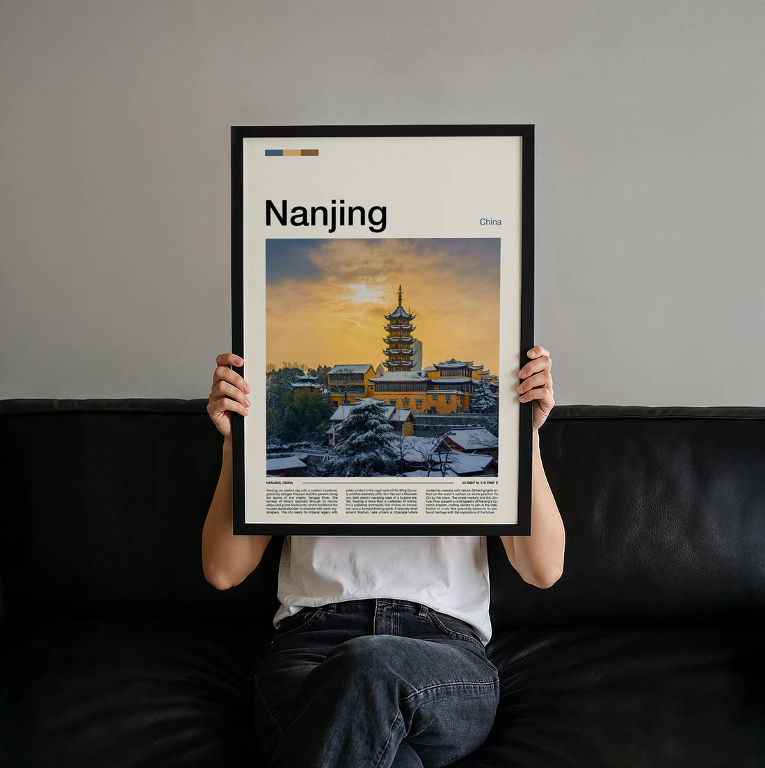 Nanjing Pagoda In Snow Travel Print held up by hand to show the size of the print
