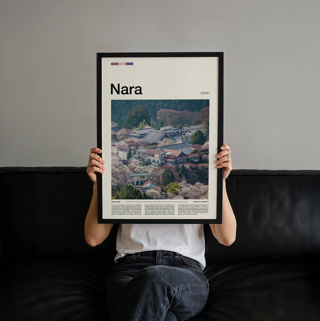 Nara Village Rooftops And Blossom Travel Print held up by hand to show the size of the print