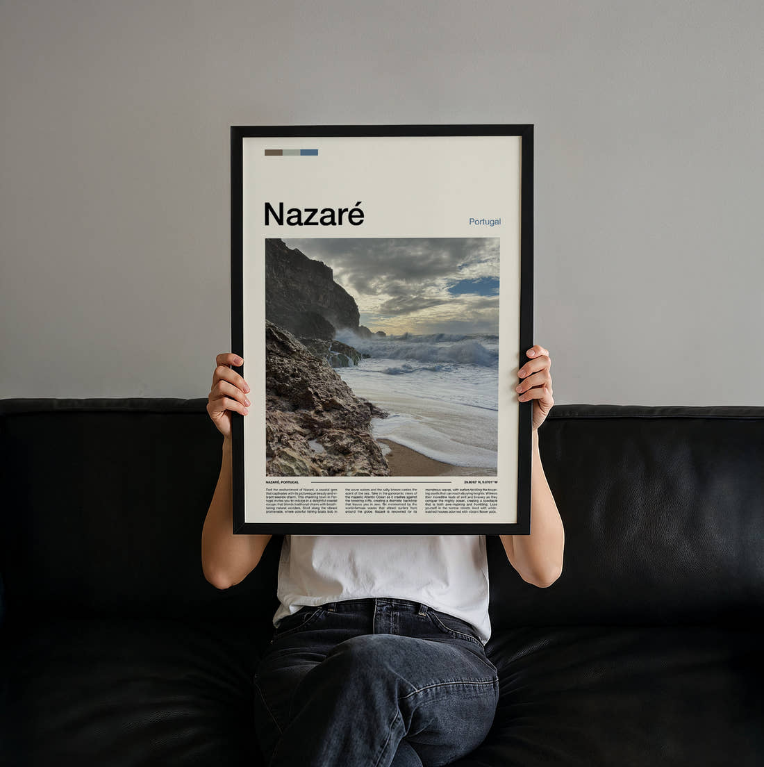 Nazare Rocky Coastline Travel Print held up by hand to show the size of the print