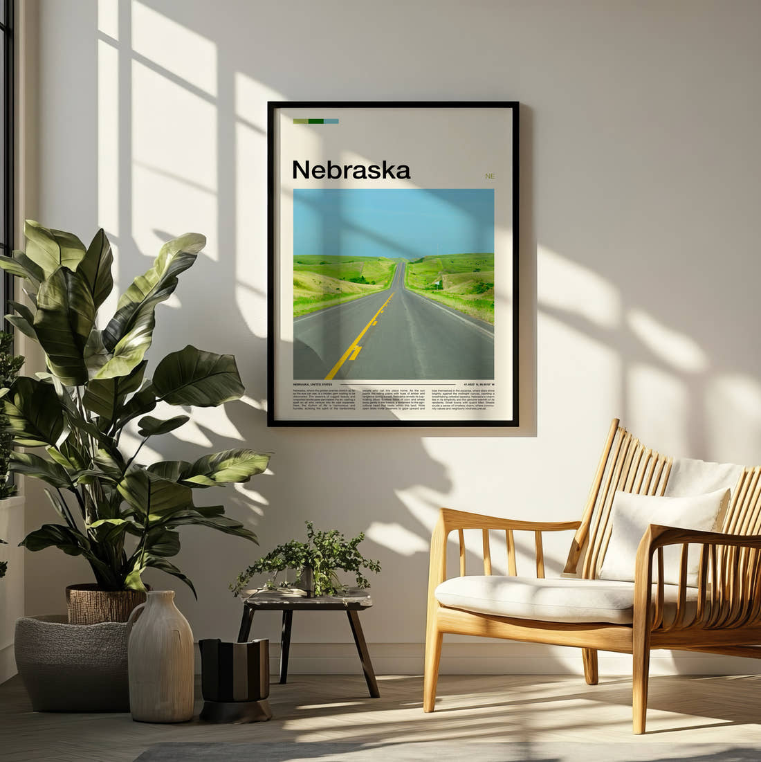 Nebraska Road Through Green Hills Travel Print framed on a pale wall beside houseplants