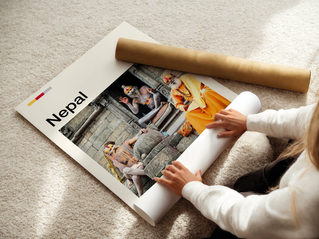 Nepal Sadhus On Temple Steps Travel Print being unrolled from its postal tube