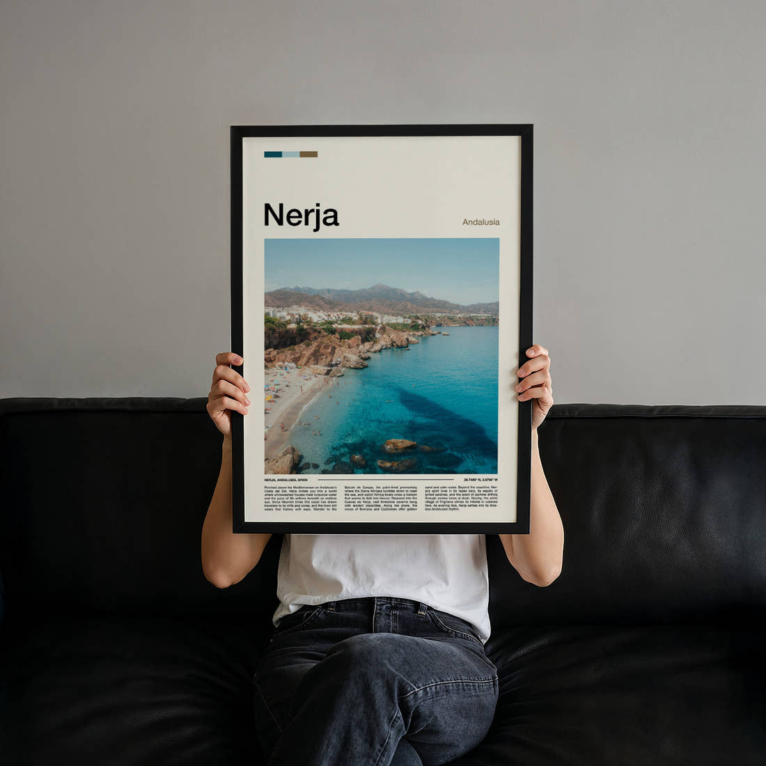 Nerja Aerial Coastal View Travel Print held up by hand to show the size of the print