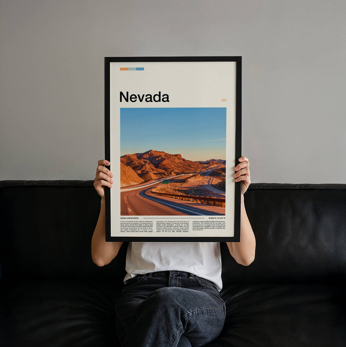 Nevada Road Through Red Rocks Travel Print held up by hand to show the size of the print