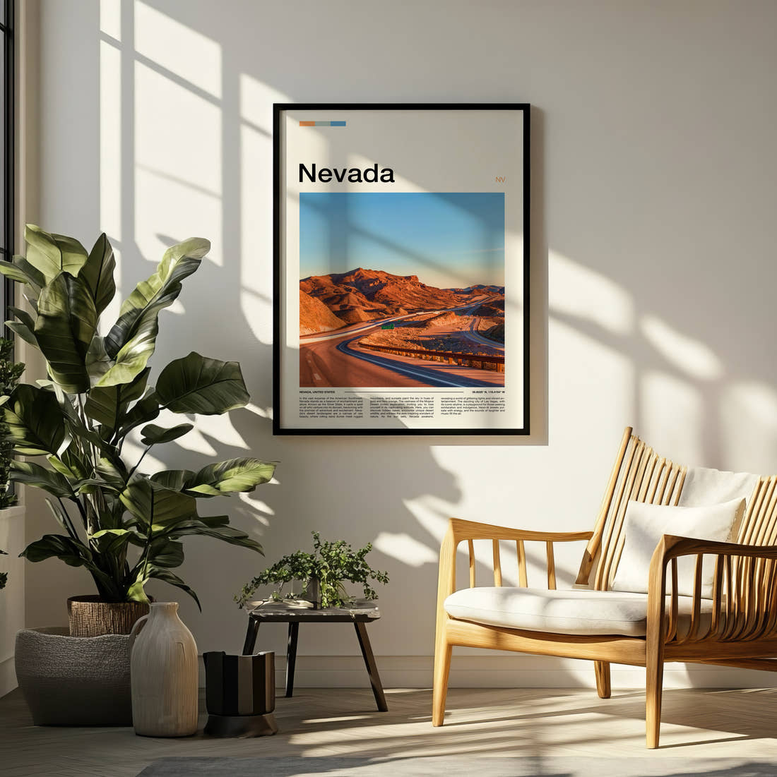 Nevada Road Through Red Rocks Travel Print framed on a pale wall beside houseplants