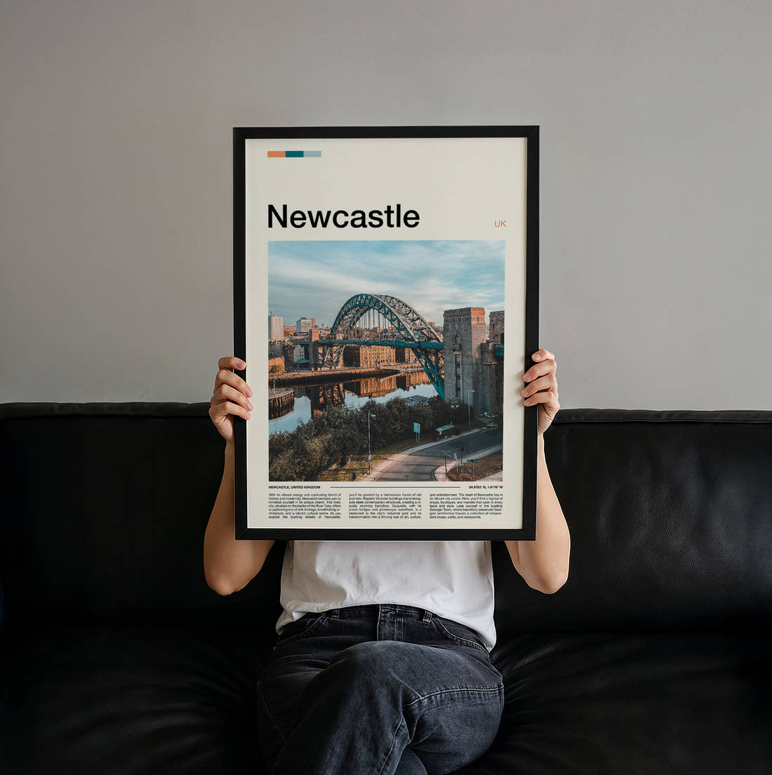 Newcastle Tyne Bridge Travel Print held up by hand to show the size of the print