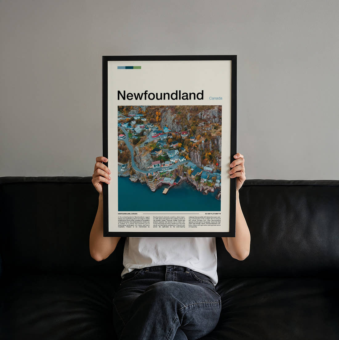 Newfoundland Colourful Coastal Village Travel Print held up by hand to show the size of the print
