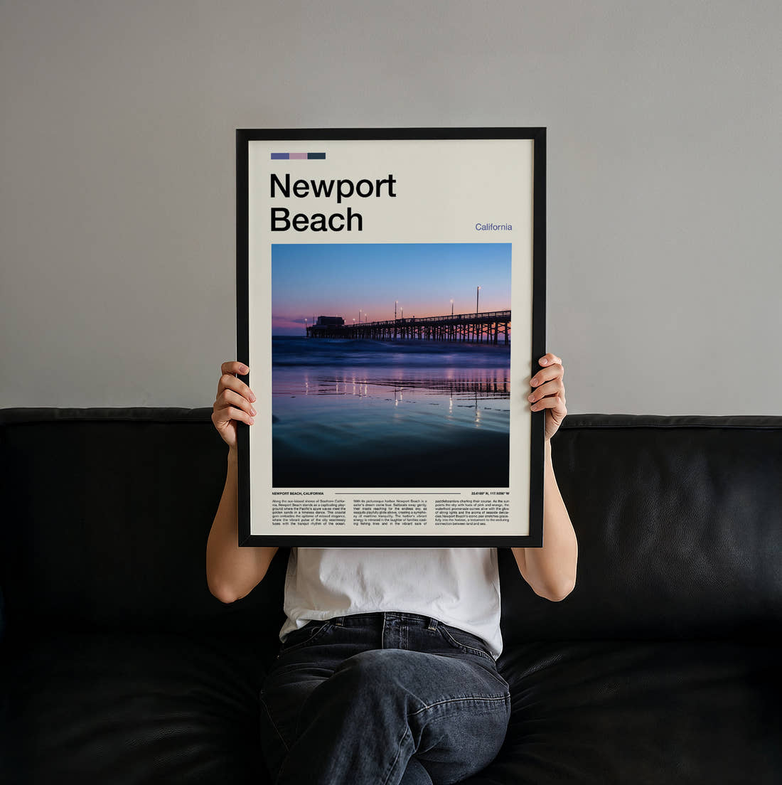 Newport Beach Pier Reflected At Dusk Travel Print held up by hand to show the size of the print