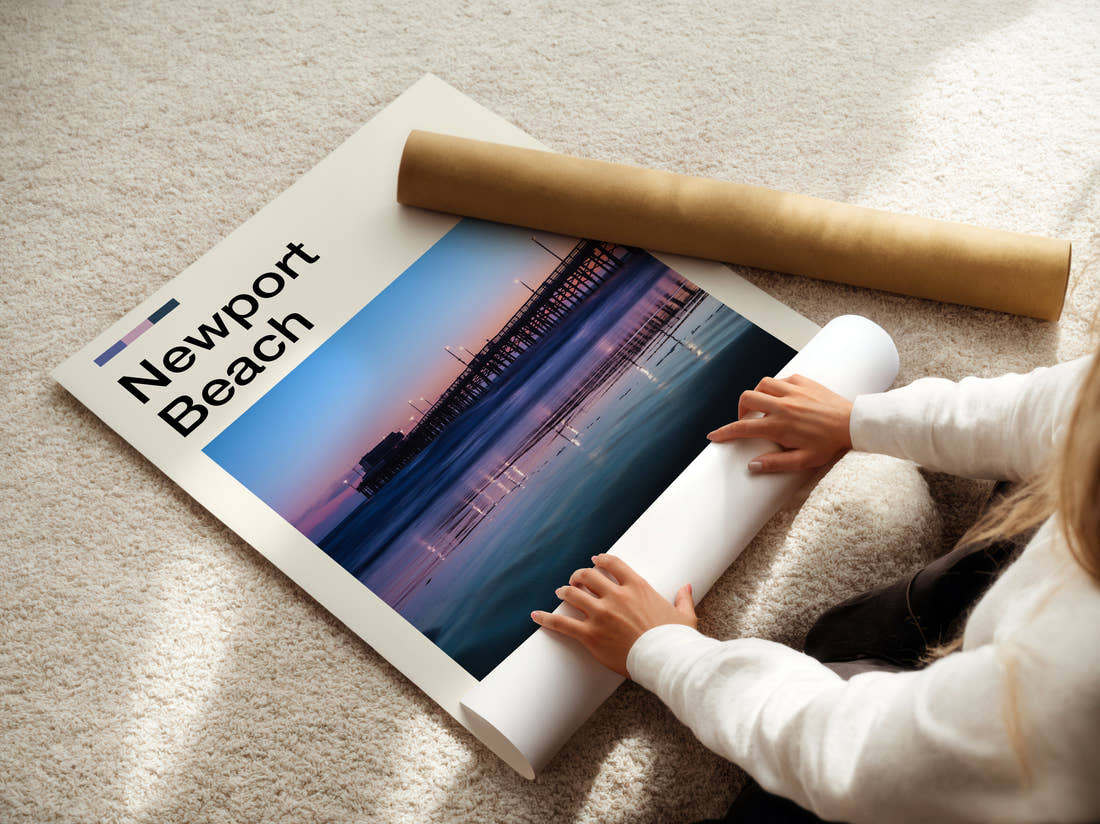 Newport Beach Pier Reflected At Dusk Travel Print being unrolled from its postal tube