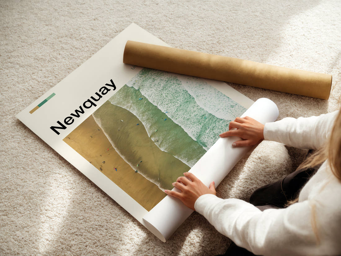 Newquay Aerial View Of The Beach Travel Print being unrolled from its postal tube