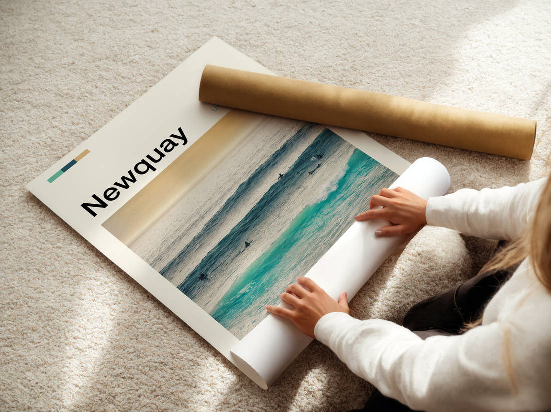 Newquay Surfers In The Waves Travel Print being unrolled from its postal tube