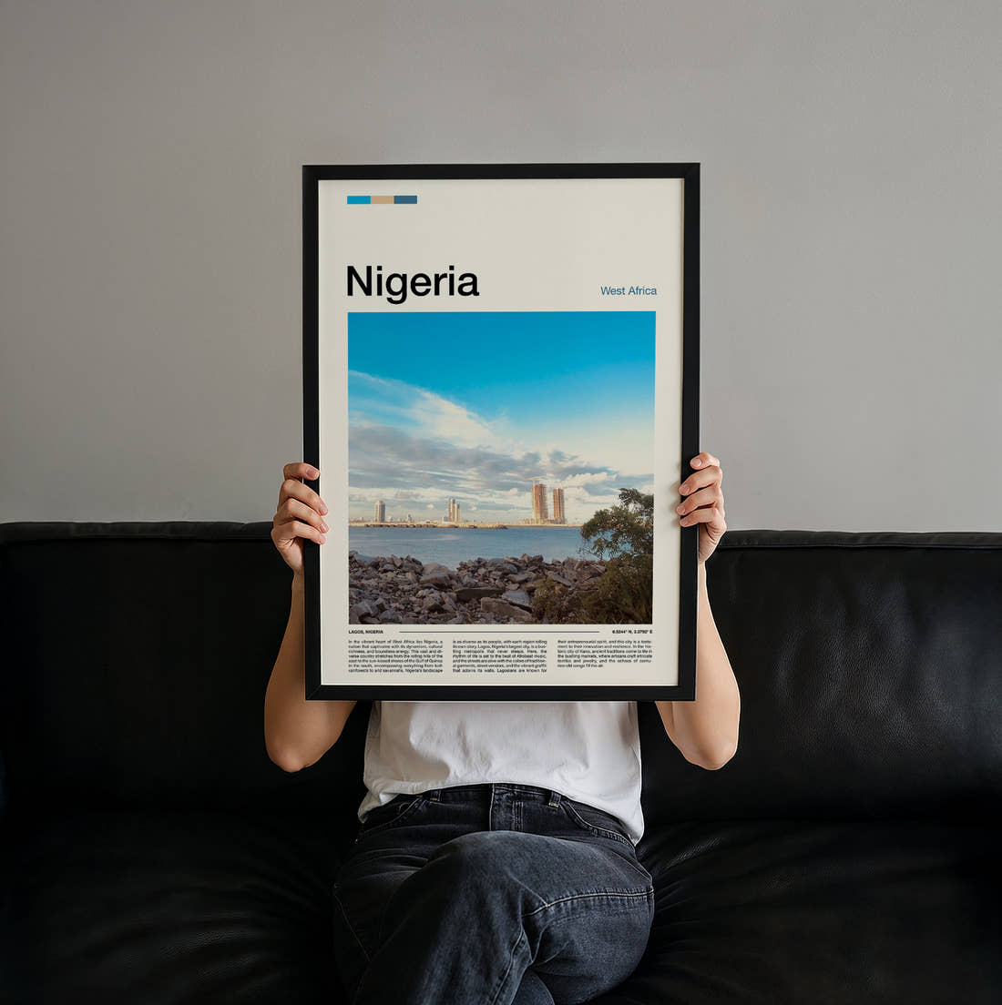 Nigeria Rocky Shoreline And Skyline Travel Print held up by hand to show the size of the print