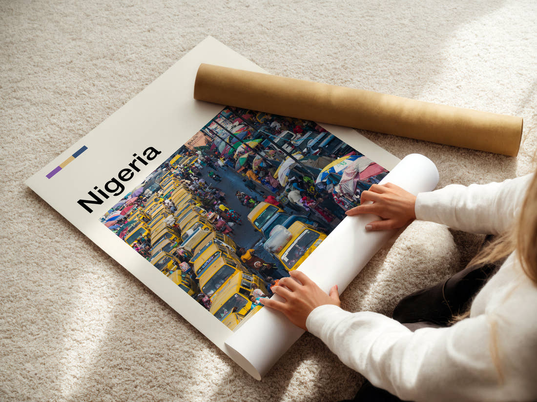 Nigeria Yellow Buses In Traffic Travel Print being unrolled from its postal tube