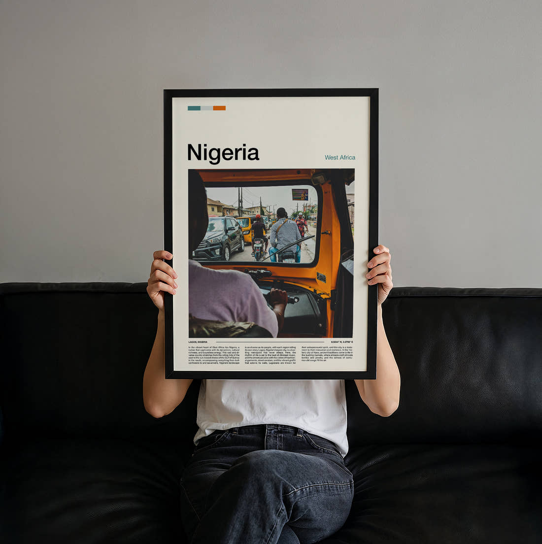 Nigeria View From A Tuk Tuk Travel Print held up by hand to show the size of the print