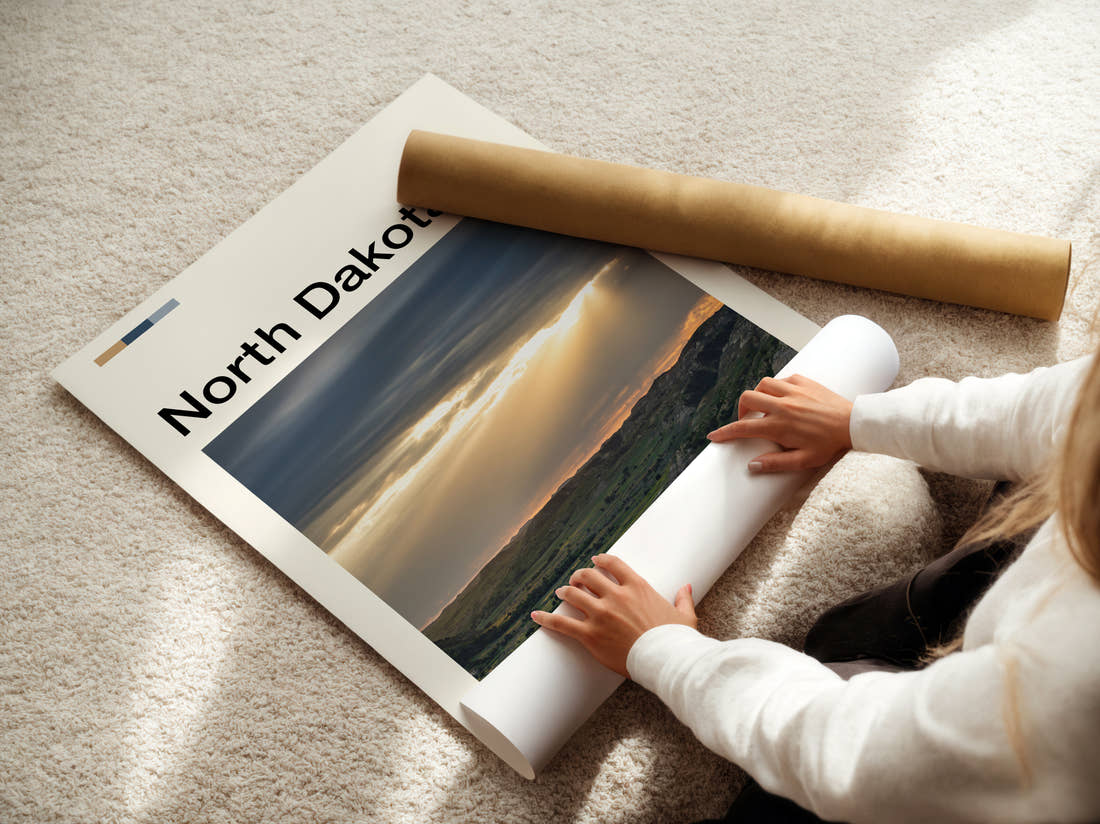 North Dakota Sunbeams Over The Plains Travel Print being unrolled from its postal tube