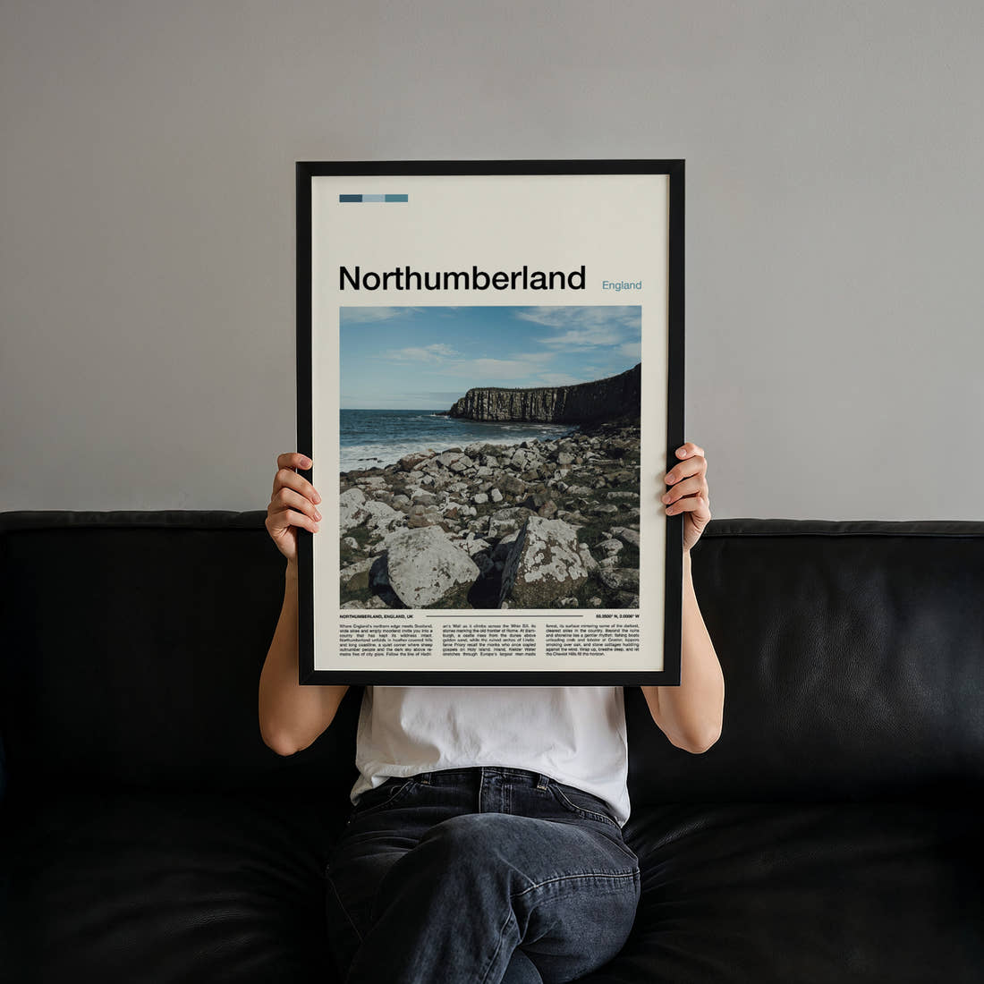 Northumberland Rocky Coastal Cliffs Travel Print held up by hand to show the size of the print