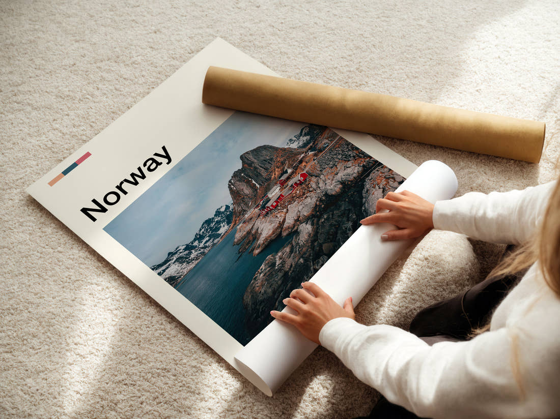 Norway Red Fishing Cabins Travel Print being unrolled from its postal tube