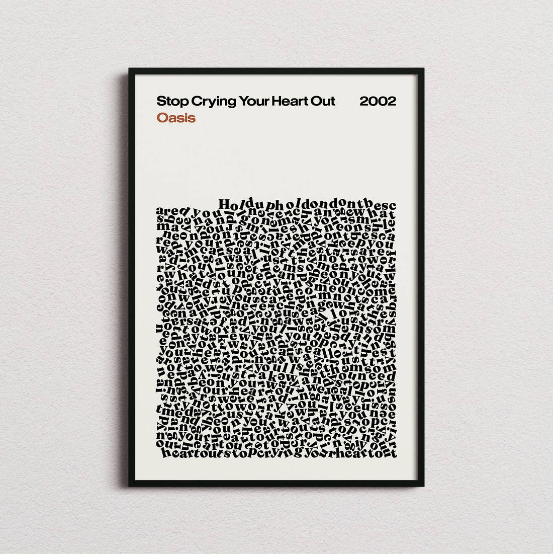 Oasis Stop Crying Your Heart Out Lyric Print in the cream colourway, framed