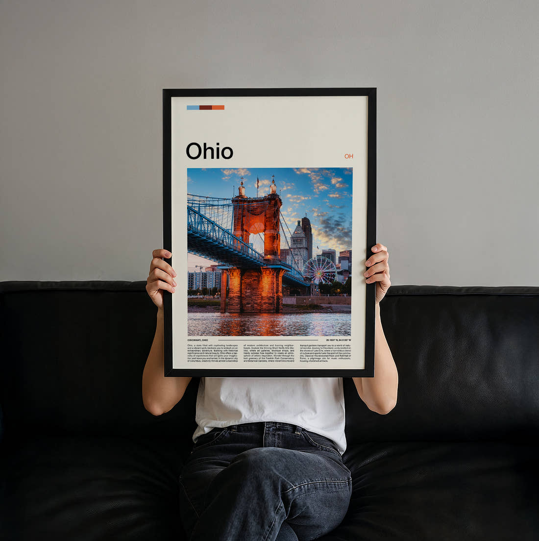 Ohio Roebling Suspension Bridge At Night Travel Print held up by hand to show the size of the print