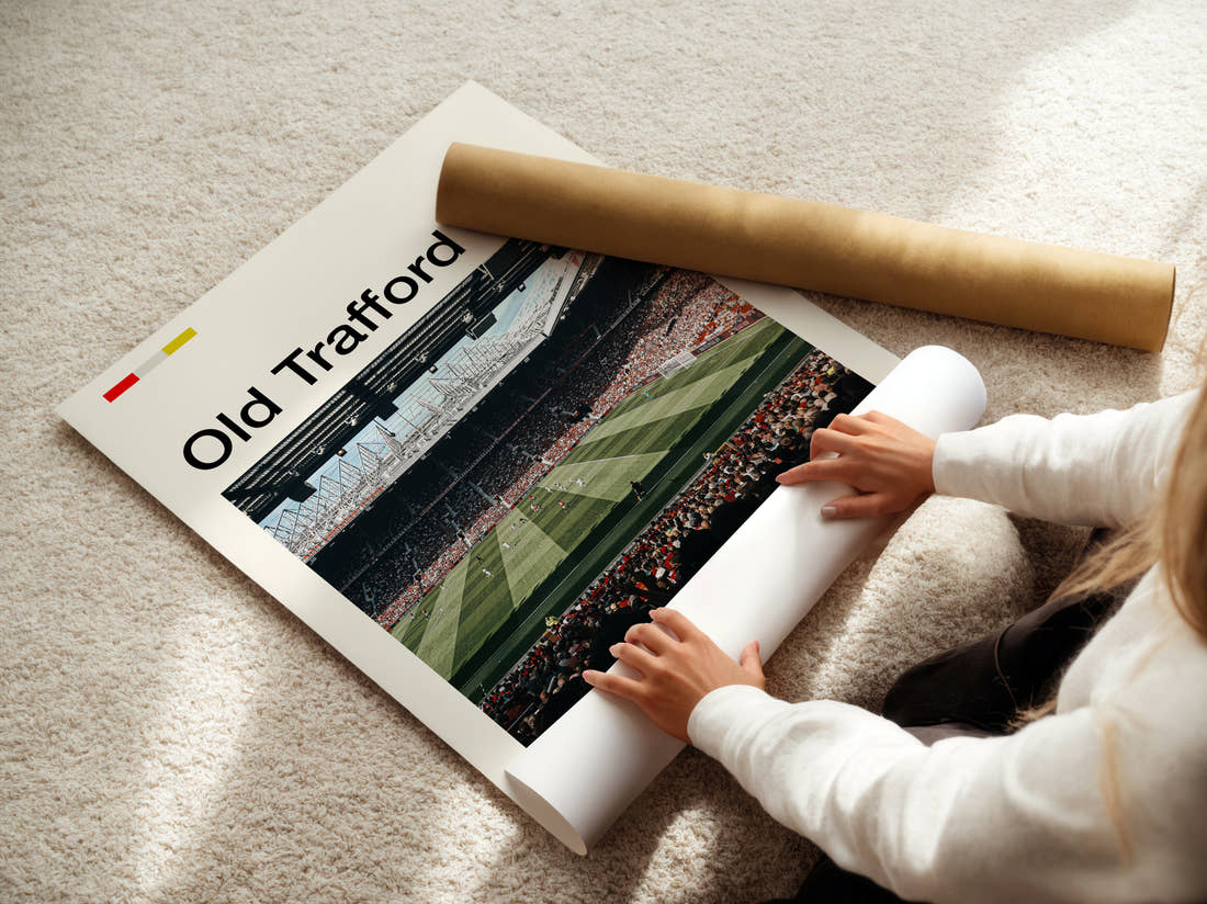 Old Trafford Stadium Print being unrolled from its postal tube