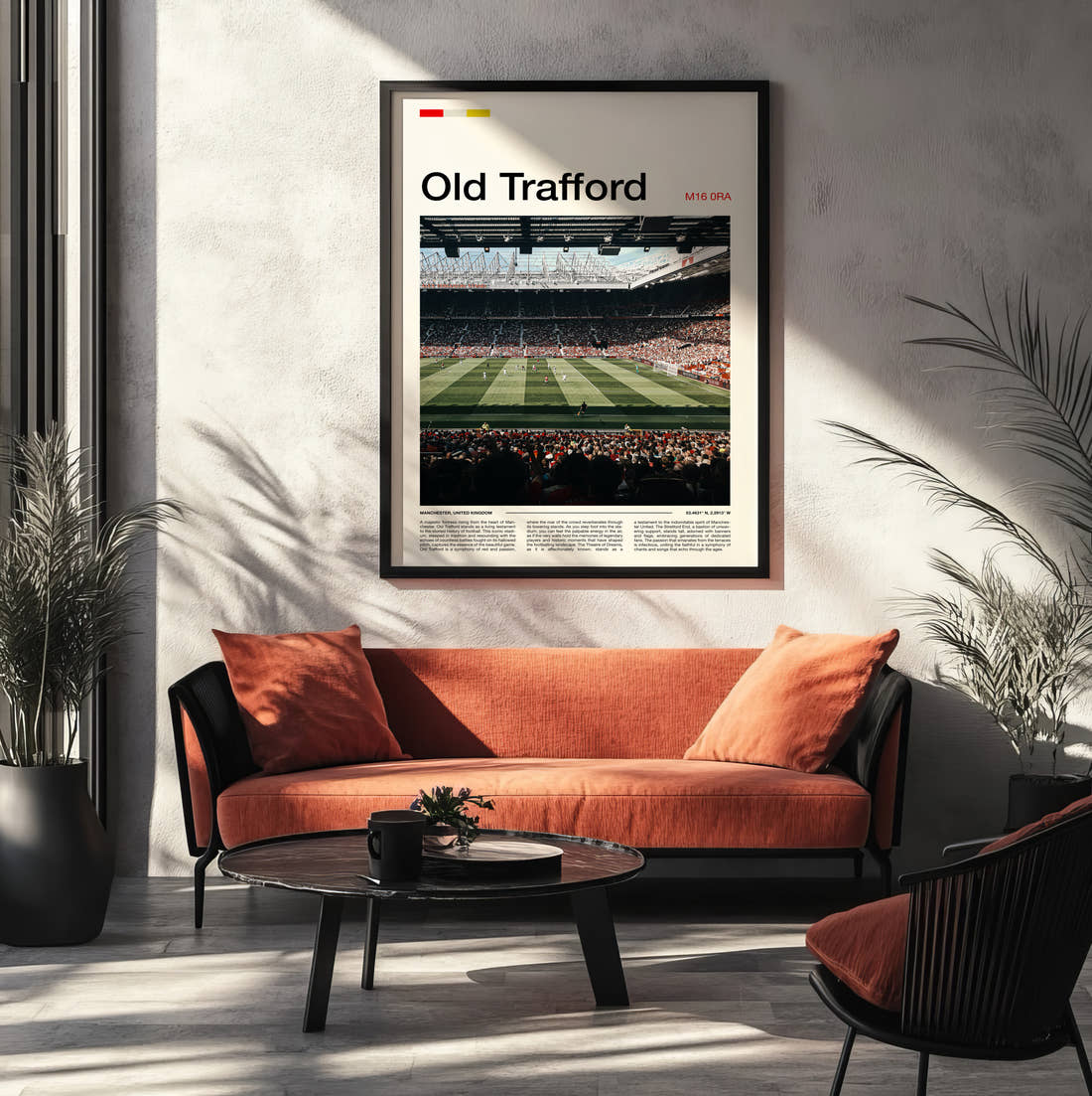 Old Trafford Stadium Print framed on the wall of a modern living room