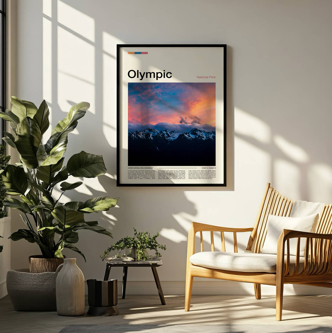 Olympic Snowy Mountains At Dusk Travel Print framed on a pale wall beside houseplants