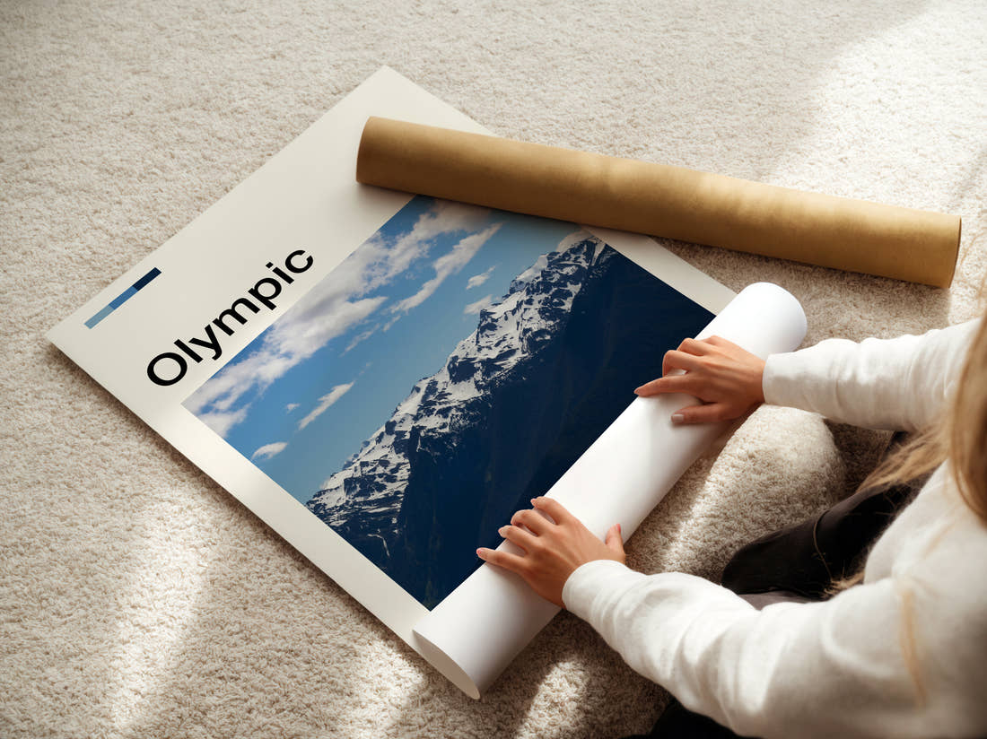 Olympic Snowy Mountain Range Travel Print being unrolled from its postal tube