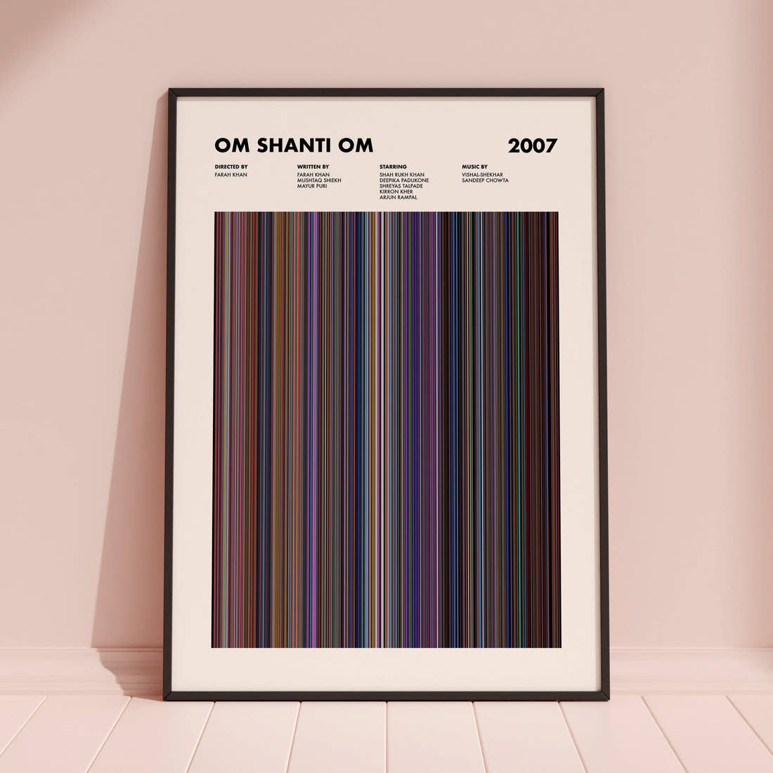 Om Shanti Om Movie Barcode Poster framed and leaning against a coloured wall