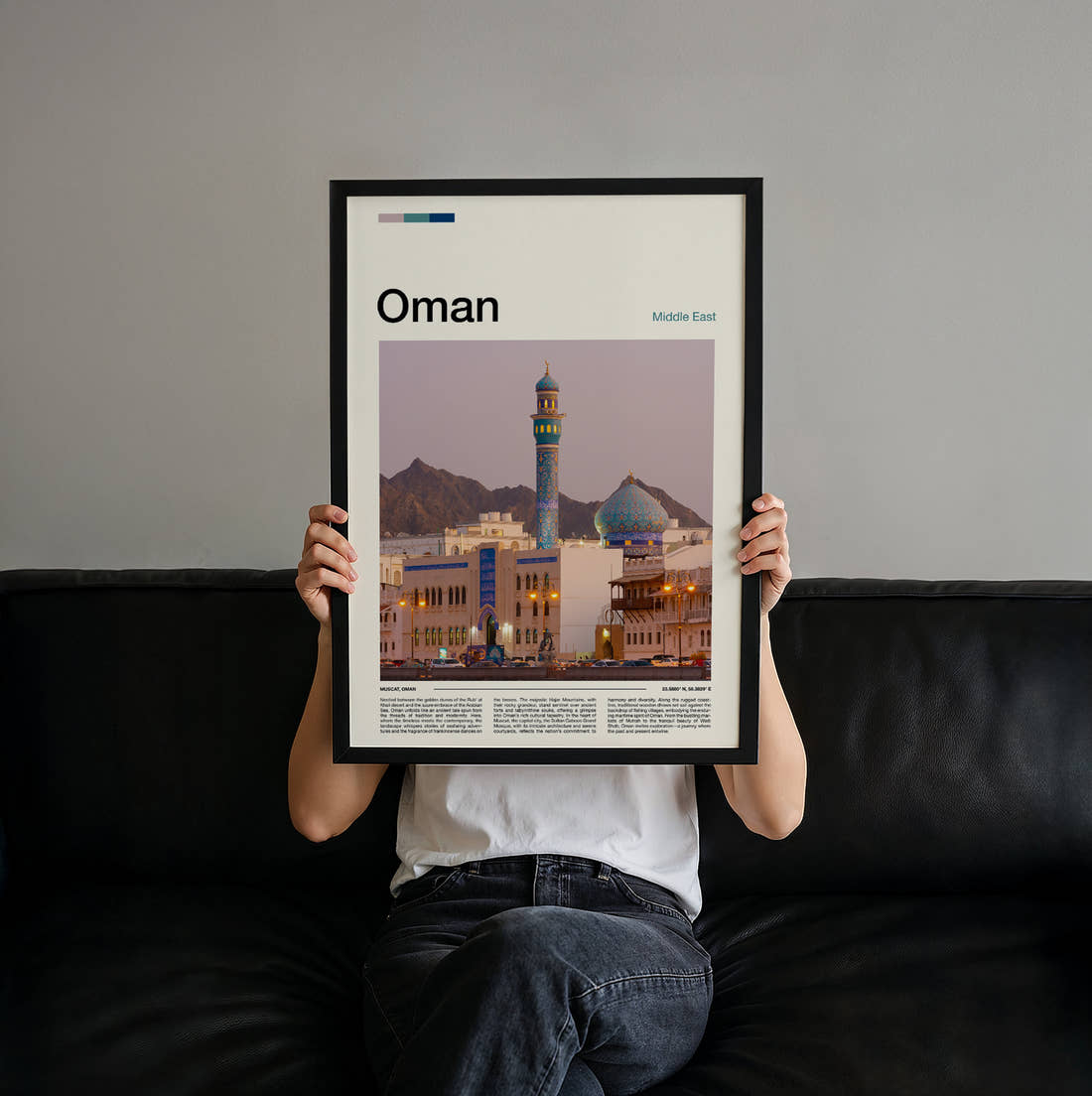 Oman Minaret And Blue Dome Travel Print held up by hand to show the size of the print