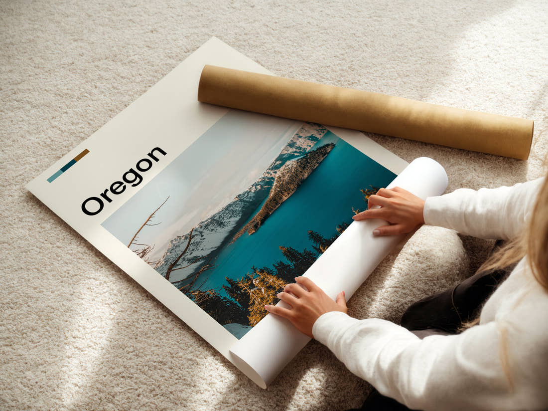 Oregon Wizard Island In Snow Travel Print being unrolled from its postal tube