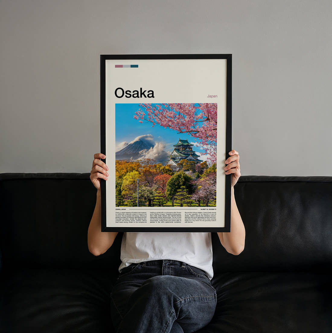 Osaka Castle Among Cherry Blossoms Travel Print held up by hand to show the size of the print