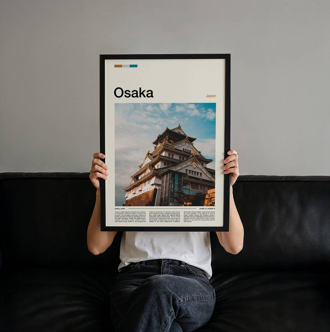 Osaka Castle Tower Travel Print held up by hand to show the size of the print