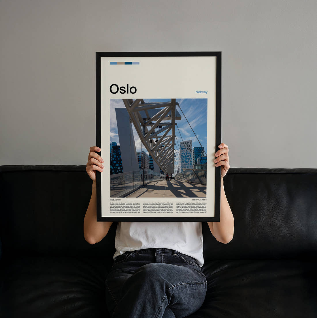Oslo Pedestrian Bridge Travel Print held up by hand to show the size of the print