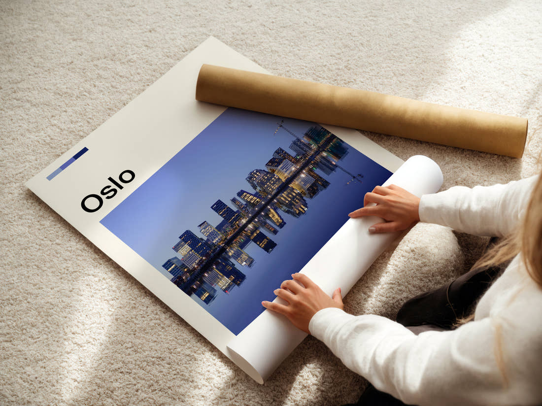 Oslo Waterfront Skyline At Dusk Travel Print being unrolled from its postal tube