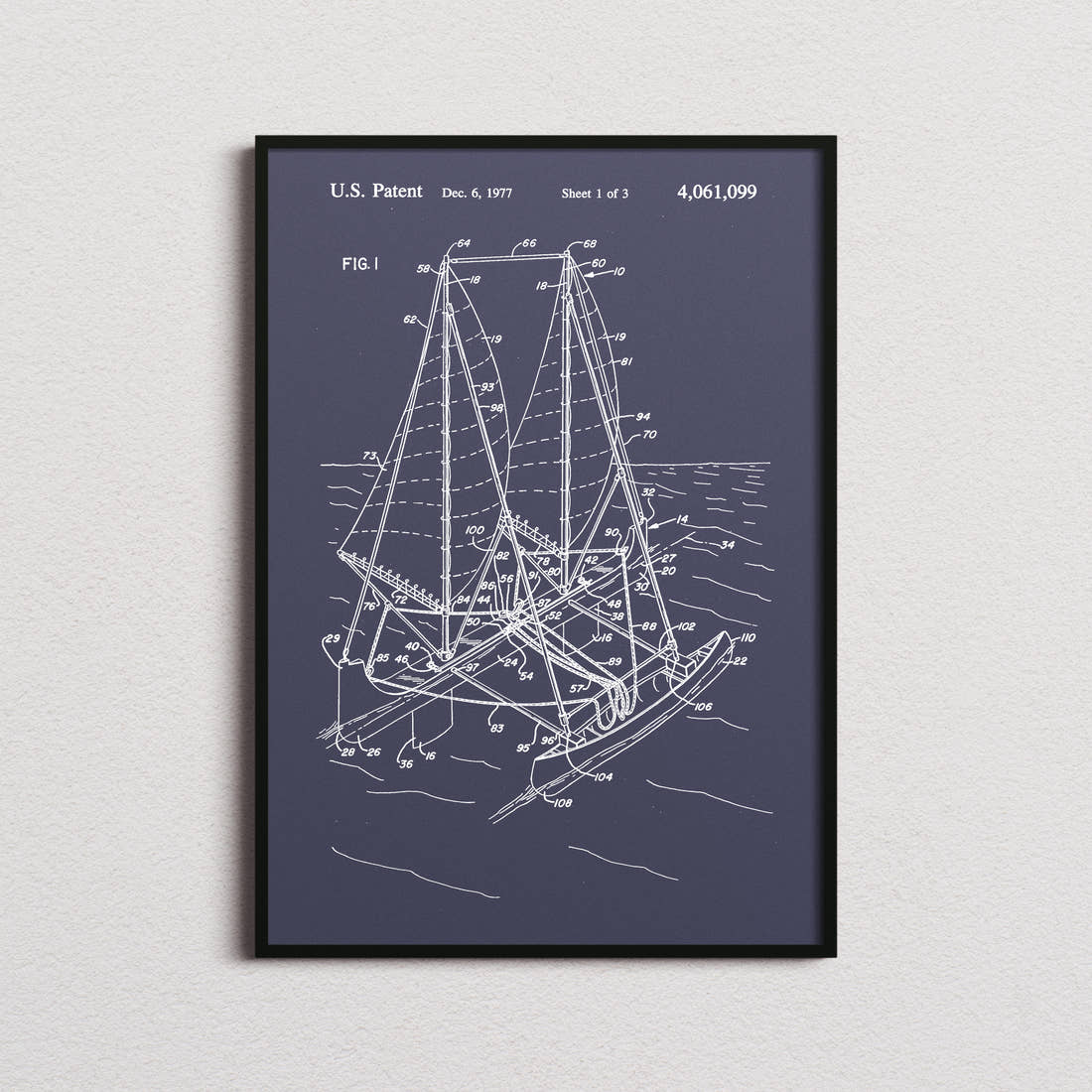 Outrigger Sailboat Patent Print in the navy colourway, framed