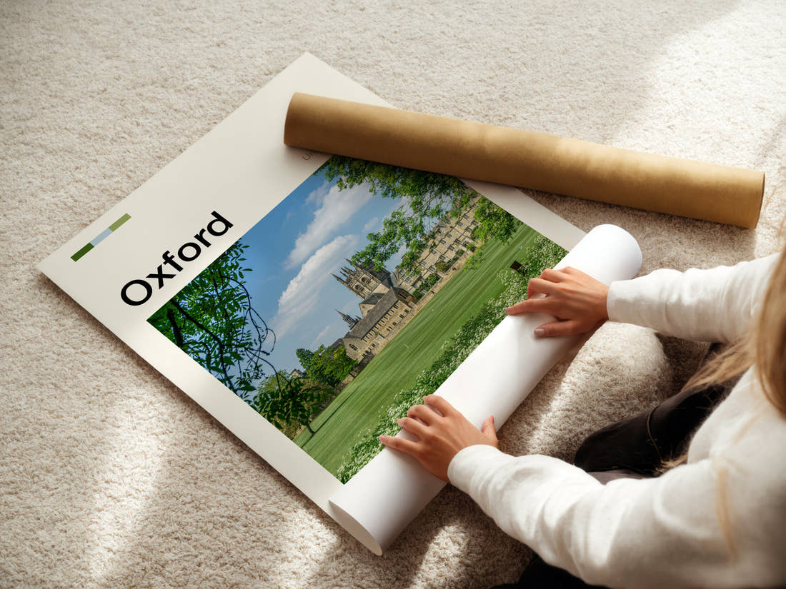 Oxford College Tower And Lawn Travel Print being unrolled from its postal tube