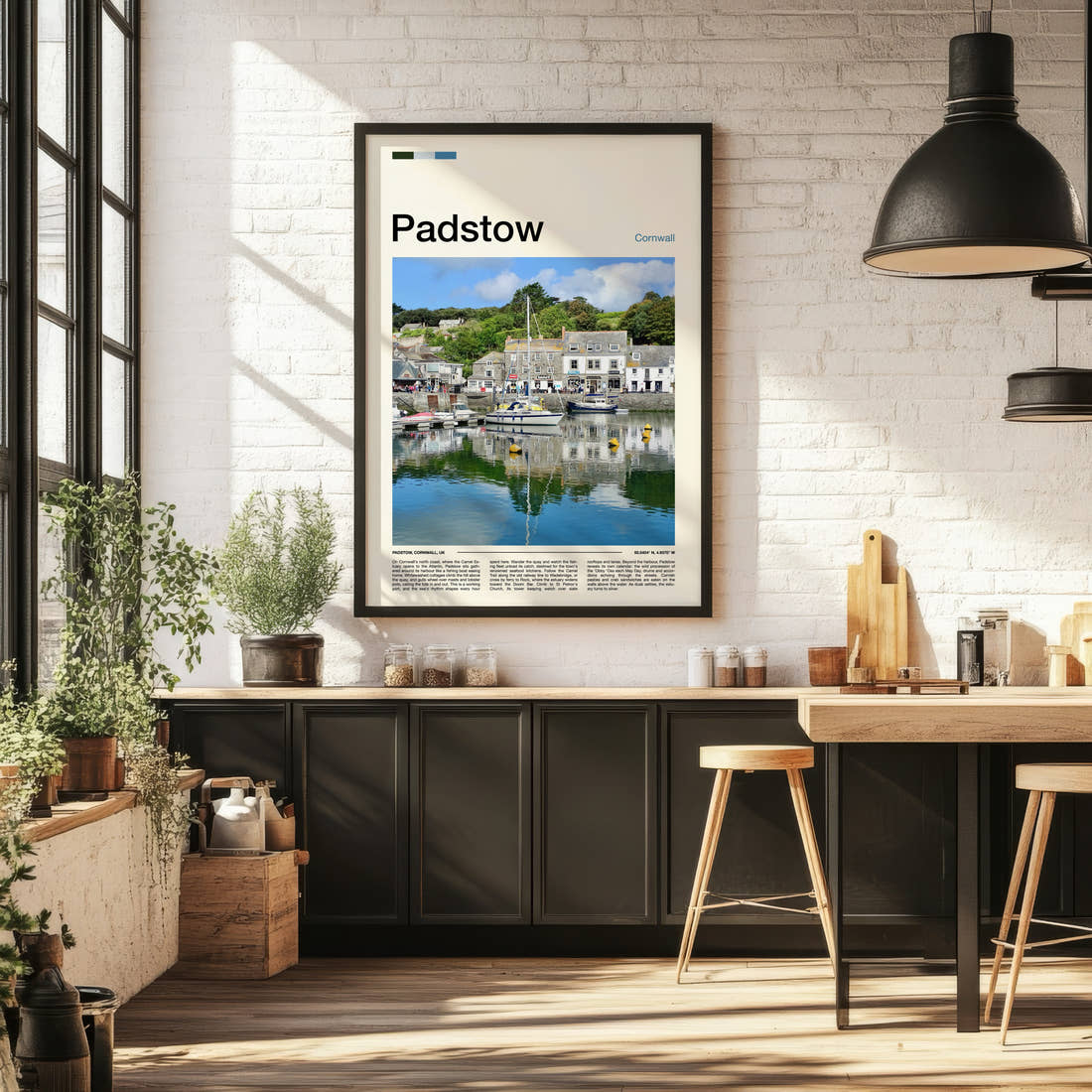 Padstow Harbour Reflections Travel Print framed on the wall of a bright kitchen and dining space