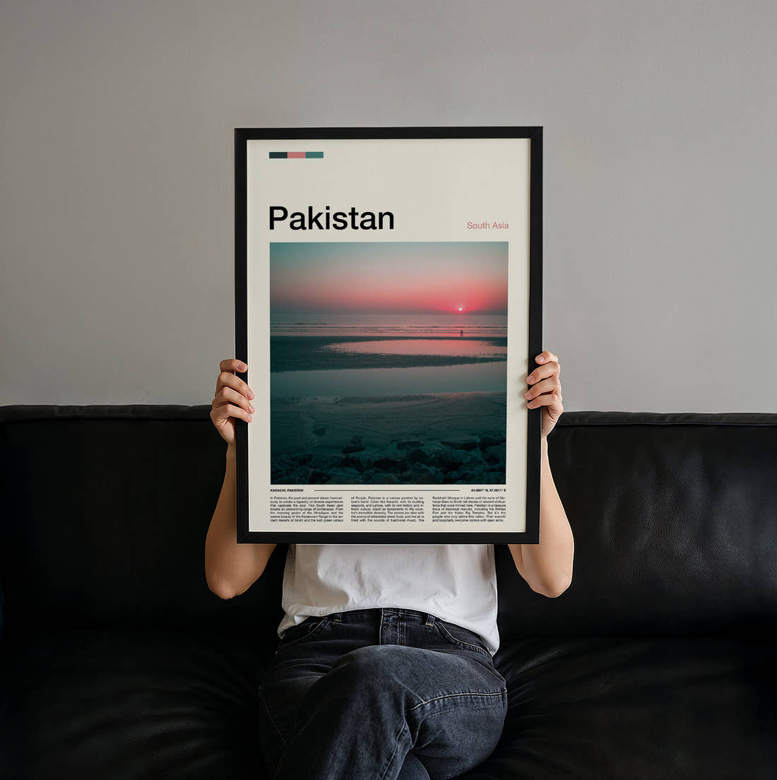 Pakistan Sunset Over The Sea Travel Print held up by hand to show the size of the print