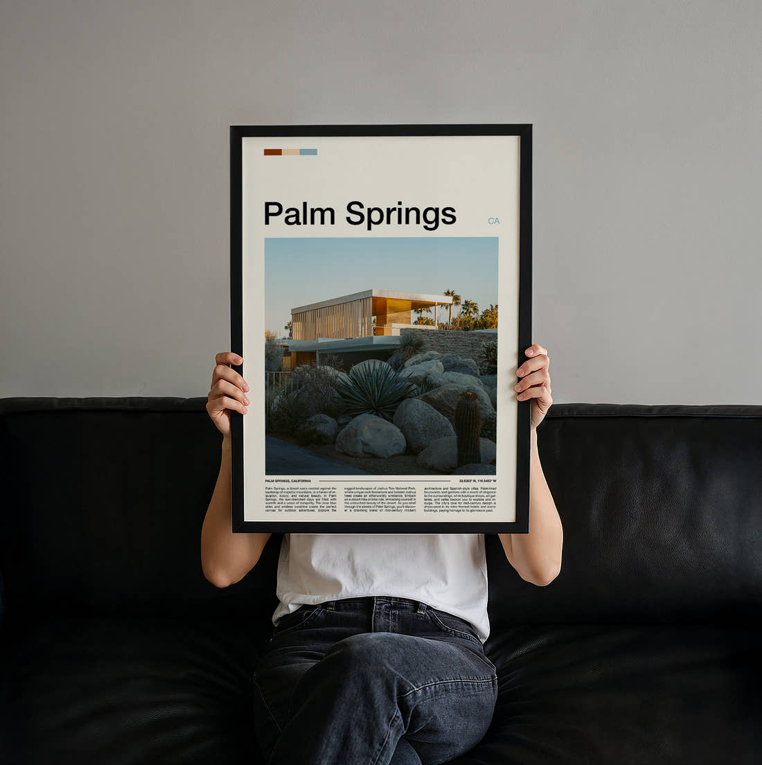 Palm Springs Modernist House Among Boulders Travel Print held up by hand to show the size of the print