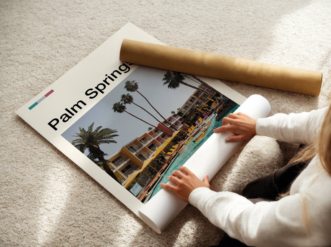 Palm Springs Poolside Loungers And Palms Travel Print being unrolled from its postal tube